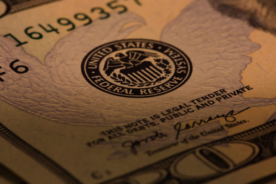 Gold price halts decline but remains pressured by hawkish Fed